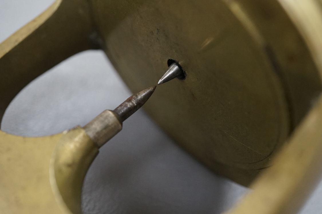 A late 19th/early 20th century brass watchmaker's uprighting tool, 21cm.